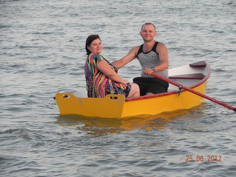 Two people aboard Dixi Dinghy