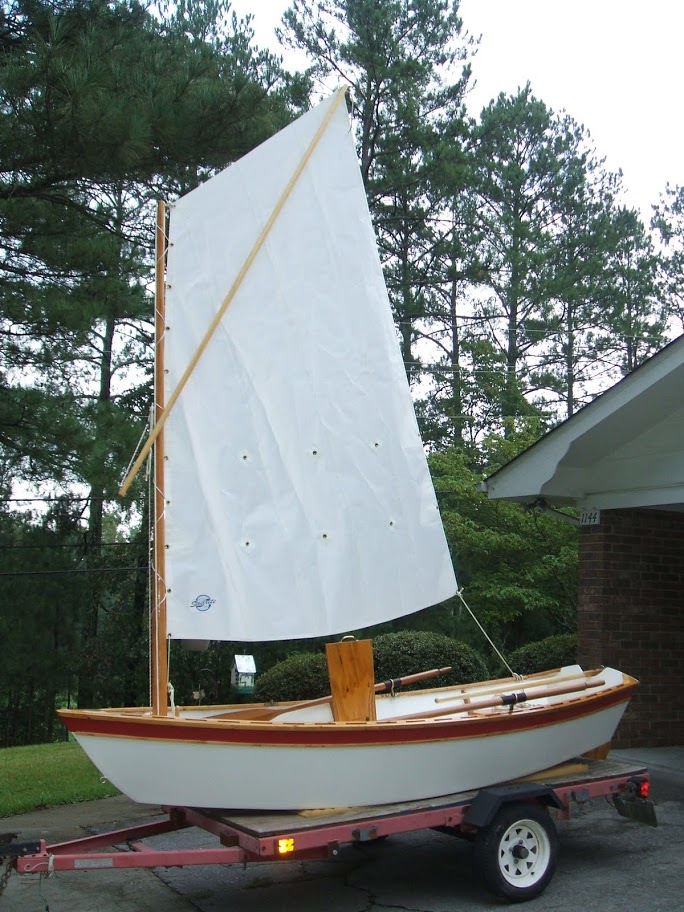 Semi Dory 11. [SD11] Flat bottom dory type dinghy. Oars, sail or 