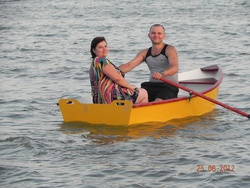 Two people aboard Dixi Dinghy