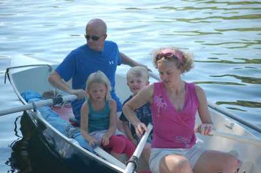 Two adults and two children aboard